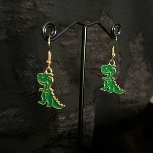 Gold toned with green enameled Trex dinosaur fishhook earrings